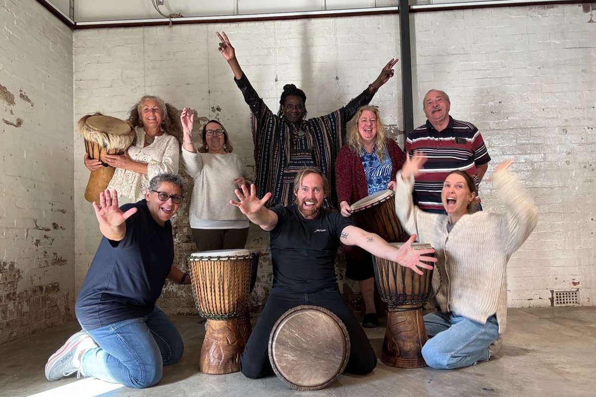Participants completing InRhythm Drum Circle Facilitator Training in Brisbane with Senior Facilitator Jason Hand
